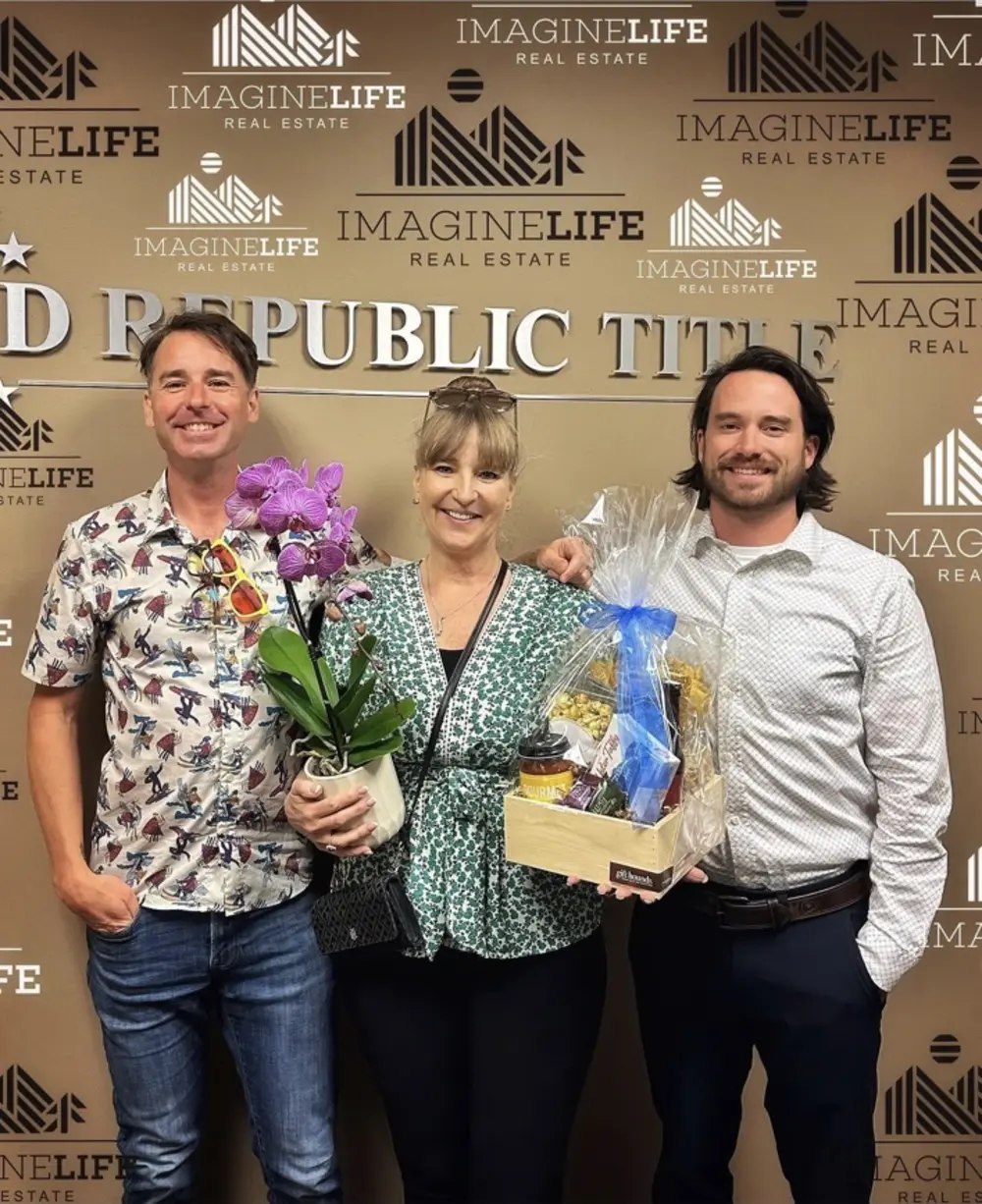 David celebrating a successful closing with clients