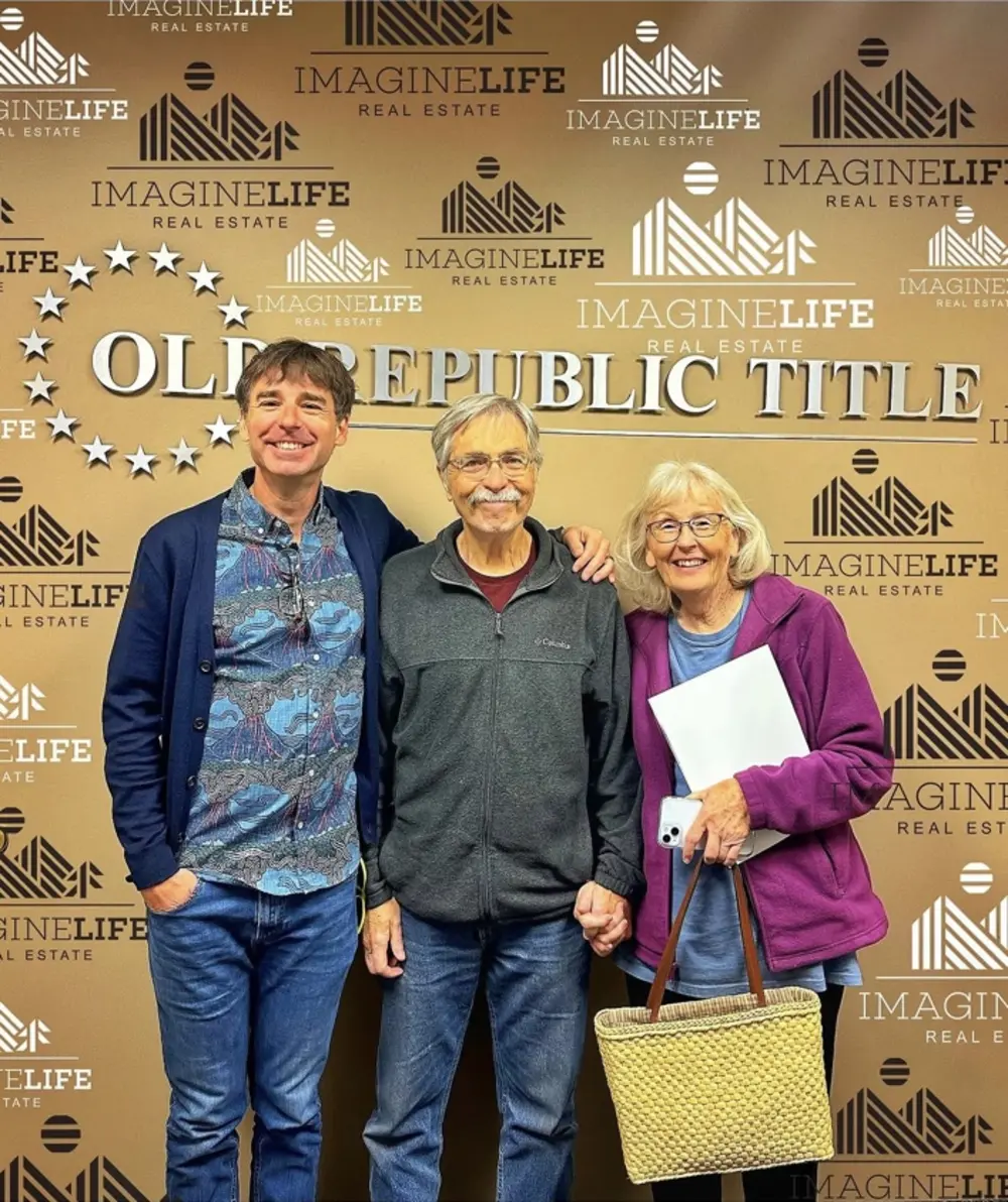 David Owen celebrating a home purchase with clients